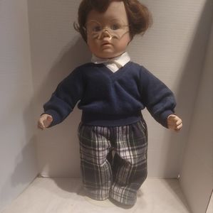 Signed and numbered j zook boy doll